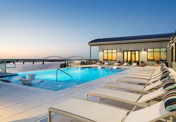 Resort-style pool & clubhouse elevated 108ft above river